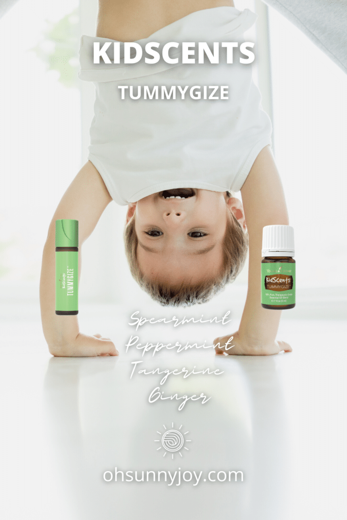 toddler doing handstand showing young living kidscents